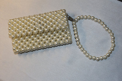 Handcrafted beaded purse with intricate design and elegant finish—perfect for formal events and everyday elegance.
