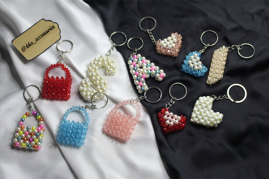 Custom-designed personalized keychain with engraved names and stylish colors—perfect for gifting or personal use.